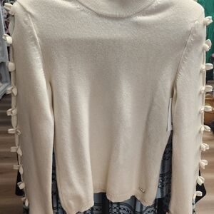 CHANEL Cream Turtleneck Sweater with Bow Accents